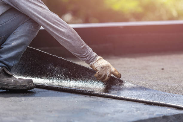 Professional Basement Waterproofing technician working in Montgomery, GA